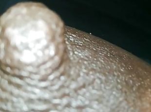 erect ebony nipples close-up