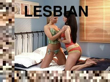 Sex hungry lesbians pleasuring each other in the bedroom