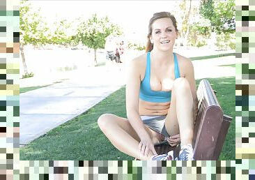 Sporty chick Brina shows her cameltoe and nice butt in a park