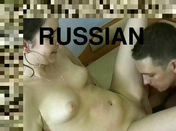 Russian teen with natural tits giving her guy superb blowjob