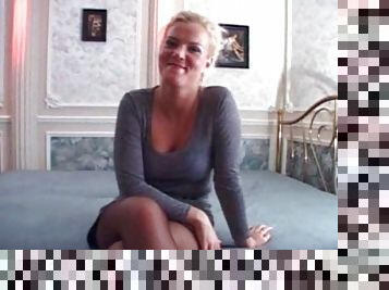 An amateur girl in stockings gets fucked in a missionary pose