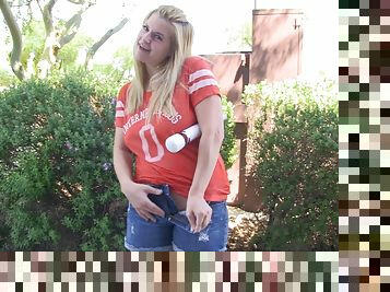Compassionate blonde solo model masturbating using a vibrator outdoor