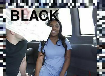 Fake-tittied black bitch gets her cunt drilled in a car
