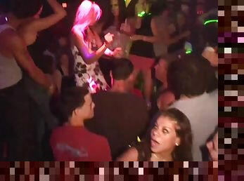 Wild girls dance and show off their asses in a night club