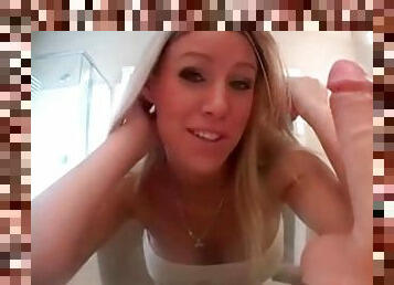 Blonde gives sexy dildo blowjob on webcam