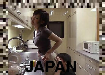 Hot Japanese housewife attacked by her insatiable lover in a kitchen