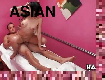 Asian masseuse rides client cock sensually