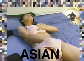 Horny And Nasty Asian Slut Rubs Her Hairy Vagina On Big Bed
