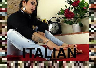Sparkly high heels on the soft feet of an Italian babe