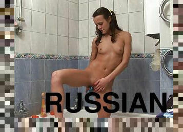 Russian solo model Nastya taking shower while masturbating