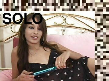 A fair lady exposing her cunt and playing with a dildo