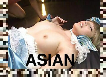 Asian girl in funny clothes is having her sweet pussy banged hard