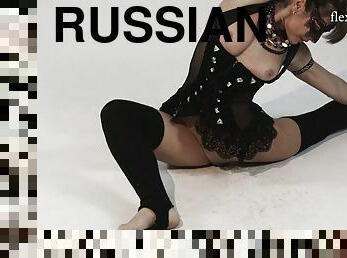 Super Russian brunette in lingerie striping seductively