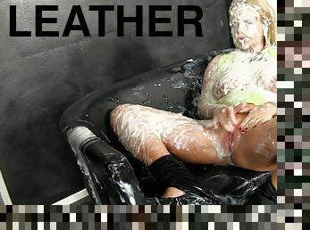 Blonde in leather pants ends up being covered in goo at a gloryhole