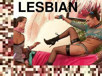 Lesbians Tory Lane and Teal Conrad dressed in fishnet and dildo fuck ass