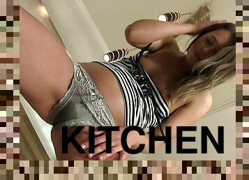 Look what this horny chick is doing in the kitchen