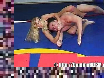 Pretty blonde babe with a sexy ass wrestling a guy