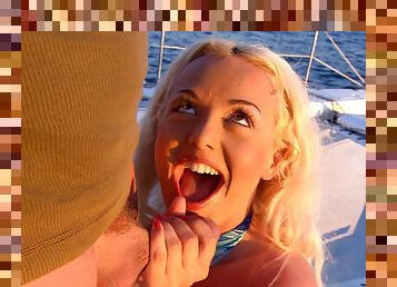 Fake tits blonde Jemstone giving dick handjob on the yacht