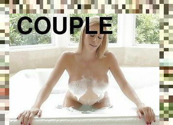 Bubble bath beauty offers her hunky lover great sexual pleasure