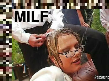 Dressed MILF in glasses gets fucked by a group of men and jizzed on