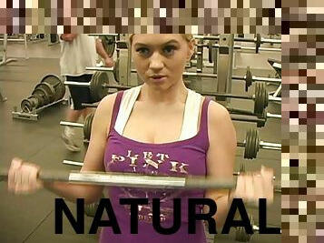 Lewd blonde Alison Angel flashes her natural boobs in a gym