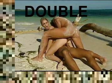 She's an amazing chick who deserves the double dicking on the beach!