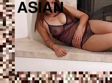 Curvy Asian models sheer lingerie for the photographer