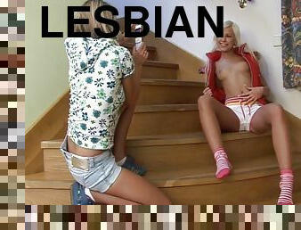 Pretty lesbians take naked pictures on the stairs and fuck