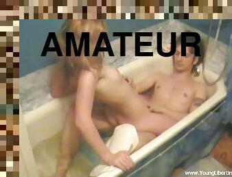 Amateur teen takes a bath with her BF and rides his dick