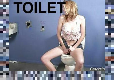 Kelly Wells sucks a gloryhole dick and gtes ass fucked in toilet