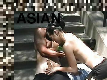 Beautiful Asian Sucks A Big Cock Outdoors In An Amateur Video