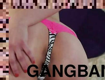 Attractive brunette in real gangbang video