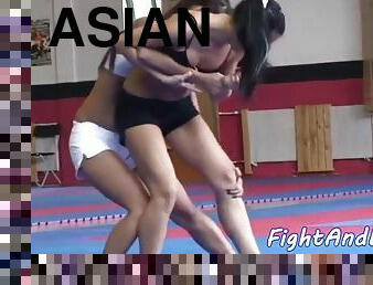 Euro babe wrestles asian lesbo beauty