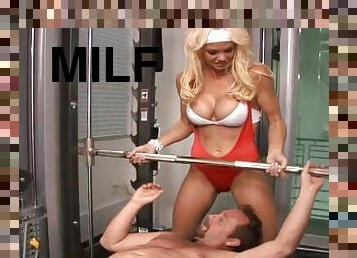 Two sporty blonde moms enjoy FFM threesome banging in a gym