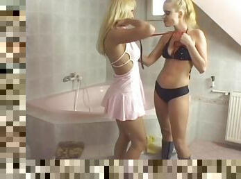 Horny blonde babes take a shower and toy their pussies