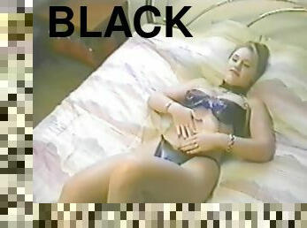 A Yummy Blonde Wearing Black Lingerie Masturbates In A Solo Model Clip