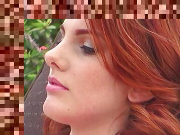 Redhead Rainia Belle rides a dick after taking sunbathes