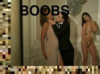 Four stunning chicks lick boobs and pussies in luxurious house