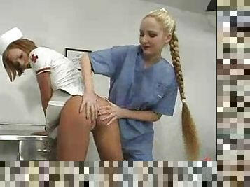 Naughty girl in nurse uniform gets punished by another babe