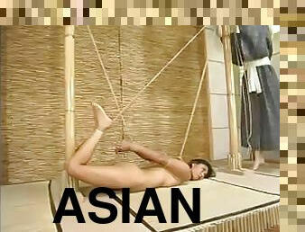 Asian slut is getting tied up and tortured by that woman