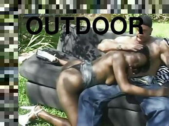 Outdoor with a curvy ebony and her black master