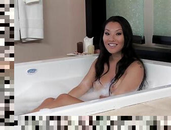 Lustful Asa Akira gives a blowjob in a bathroom