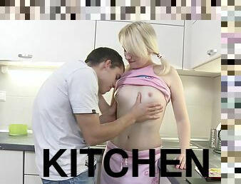 Pigtailed blonde teen gets fucked in a kitchen