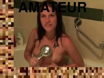 Wet amateur taking boner in mouth in the shower