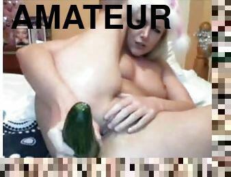 Webcam session blonde uses cucumber