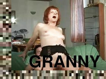Redhead Granny loves giving her stud a rim job