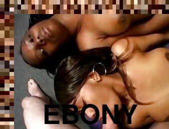 Two nasty ebony teens give a blowjob to a white guy