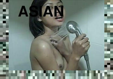 cute asian teen masturbates in shower