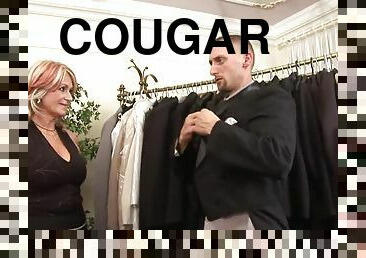 Horny cougar seduces a good-looking guy for a great fucking game