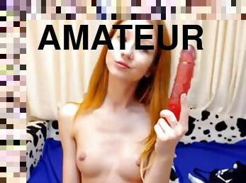 Redhead teen stripteasing showcasing her tits in amateur webcam shoot